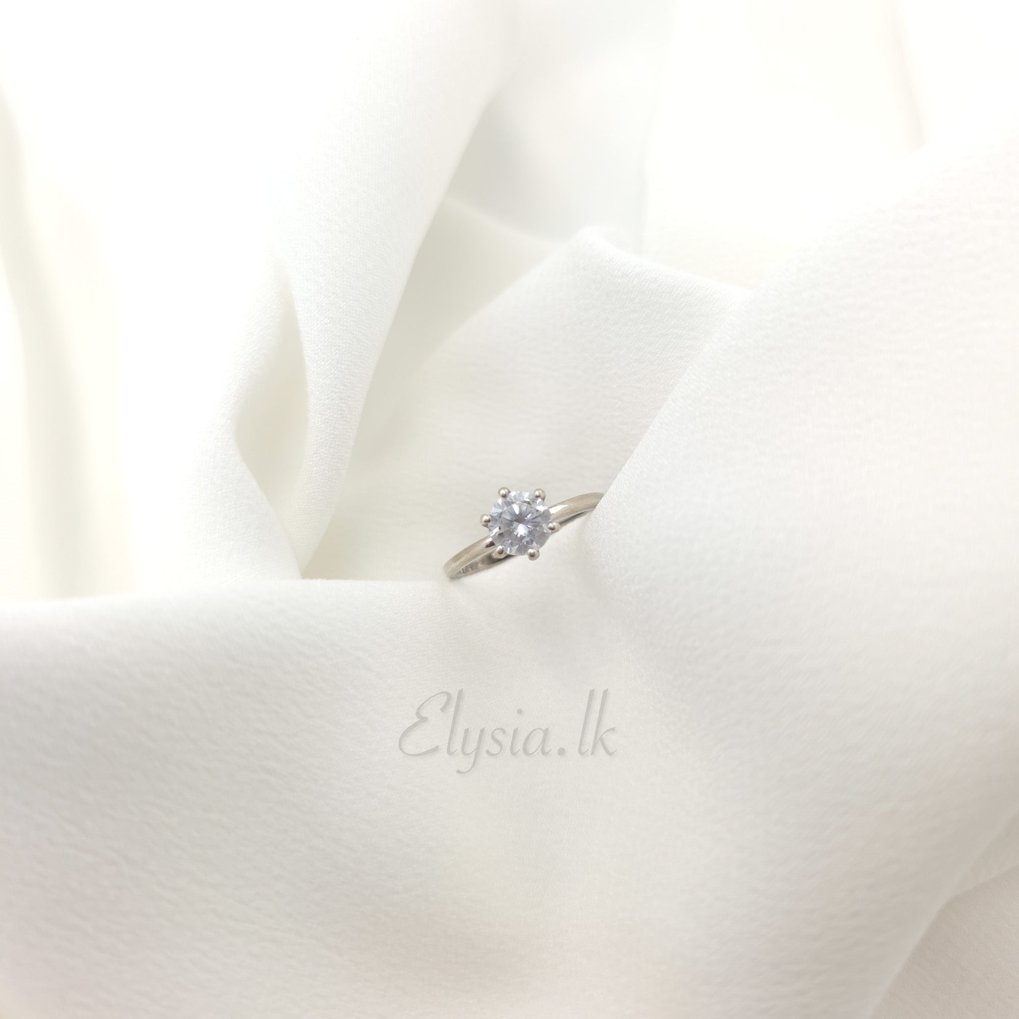 Minimalist Silver Solitaire Ring